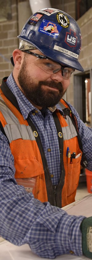 Smiling man in hard hat